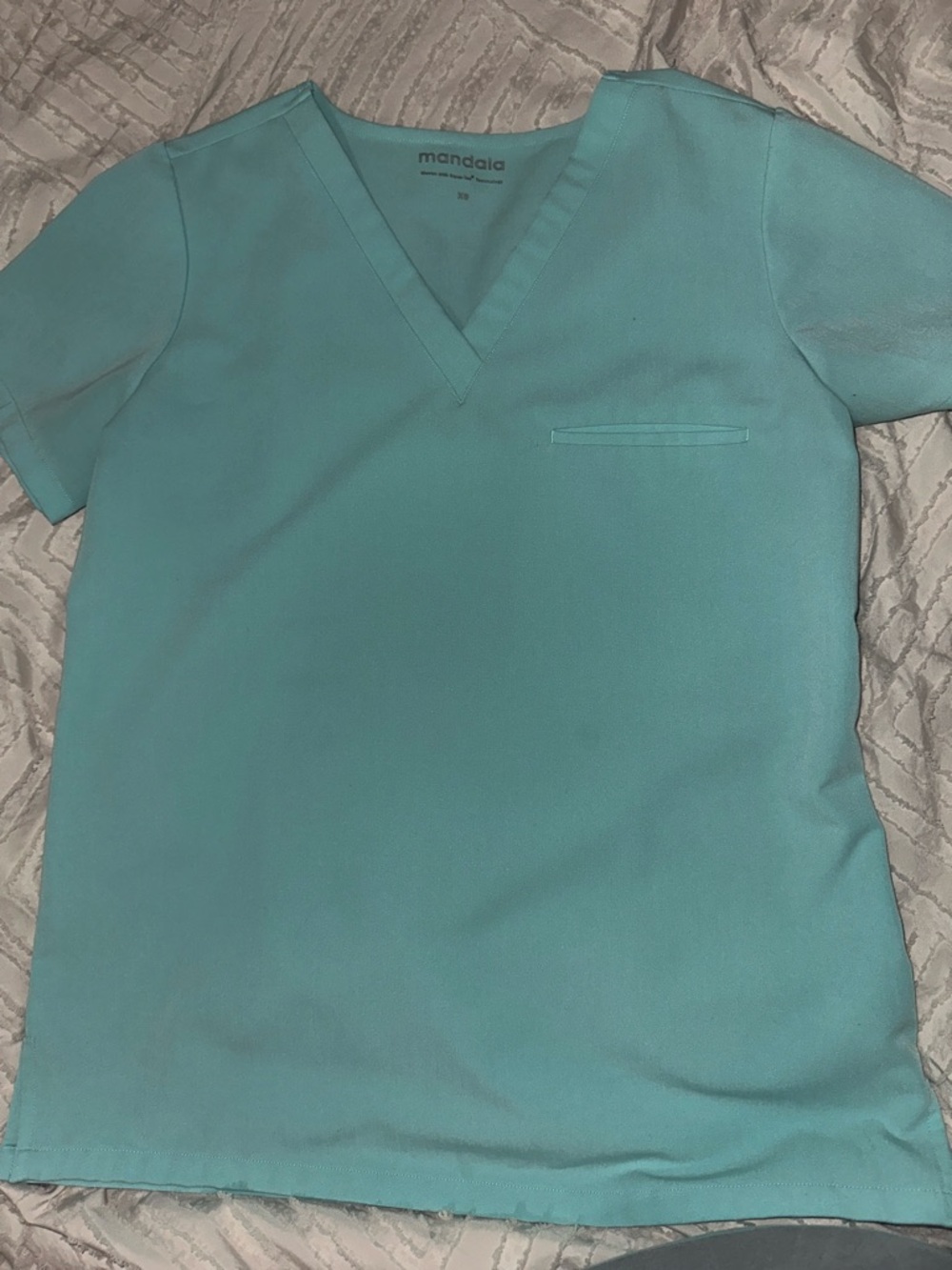 Mandala V-Neck Medical Scrub Top in Aqua. Size XS